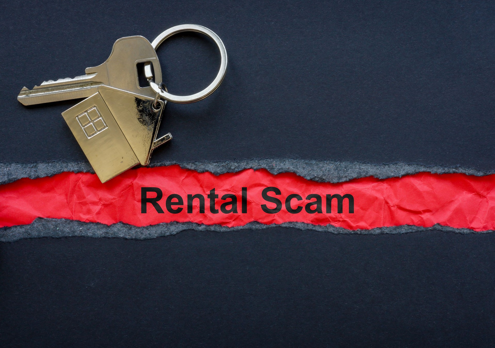 Key, torn paper and inscription rental scam.